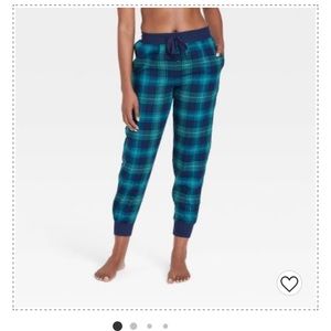 New with tags. Flannel, joggers, blue. Large.